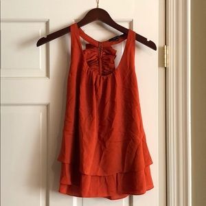 Naked Zebra orange tank